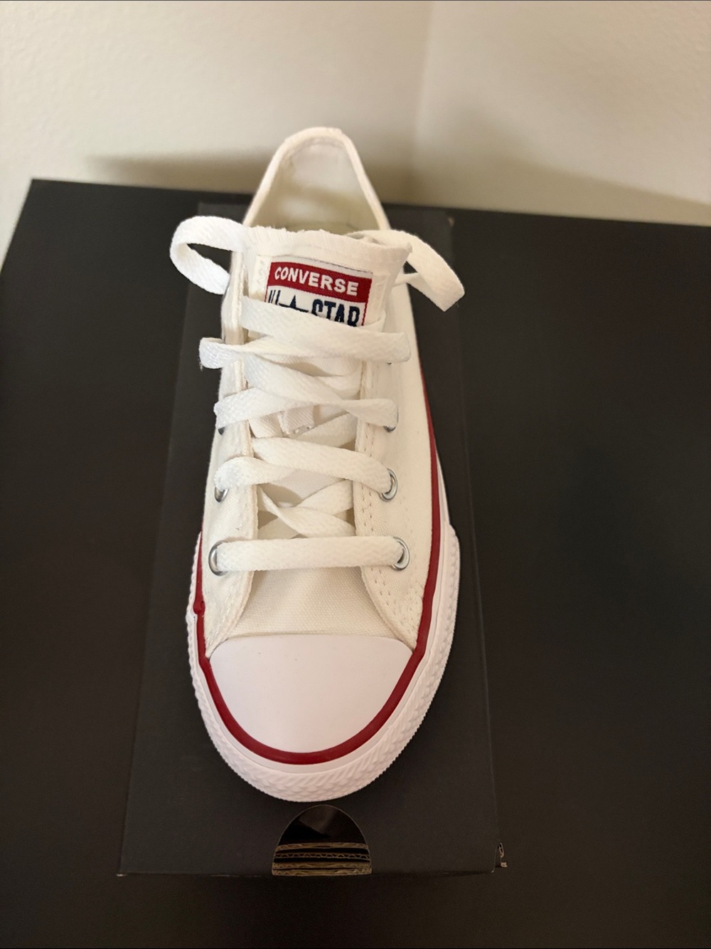 Converse Kids Low Top Sneakers in White and Red Trim